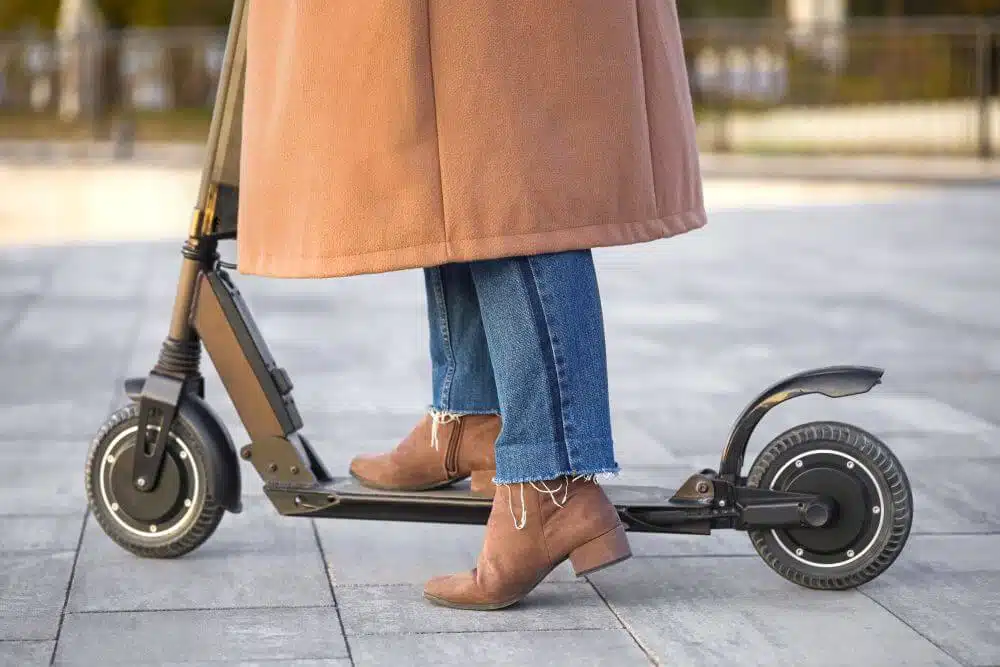 Woman on an electric scooter - CGH Injury Lawyers