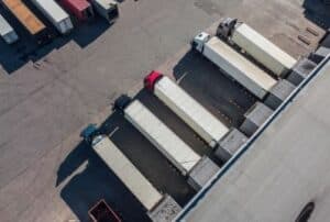 Bird eye view of semi-trucks in a parking lot