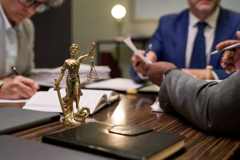 Lawyers discussing around a table